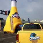 Stand gonflable publicitaire - bouteille gonflable Orangina