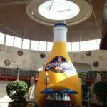Stand gonflable publicitaire - bouteille gonflable Orangina