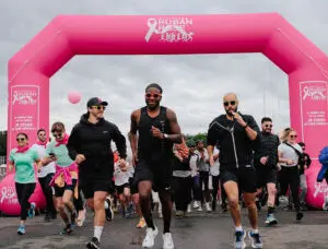 arche gonflable course sportive ruban rose