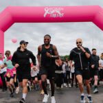 arche gonflable course sportive ruban rose